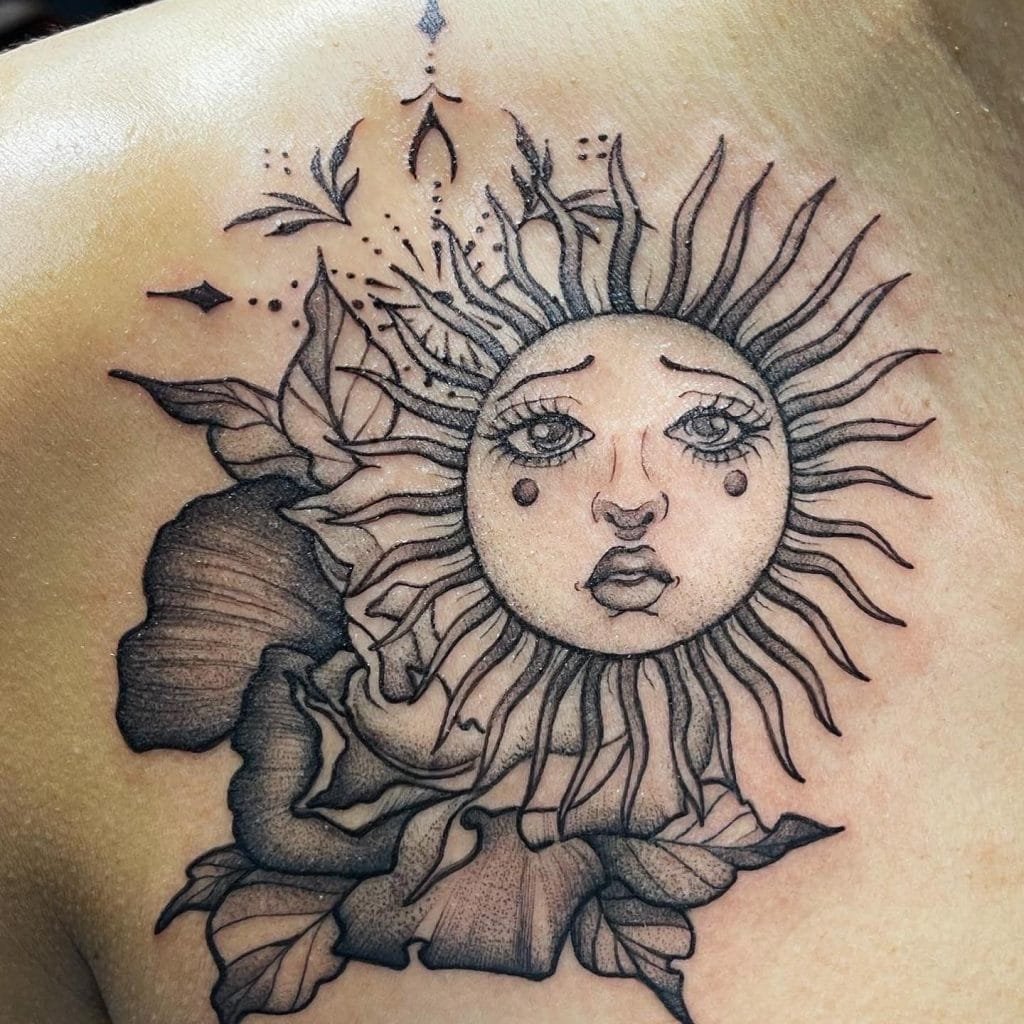 Sun Tattoo on Lower Shoulder