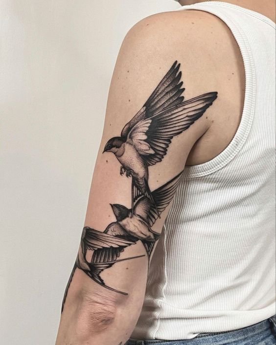 Swallow Tattoo on Upper Arm